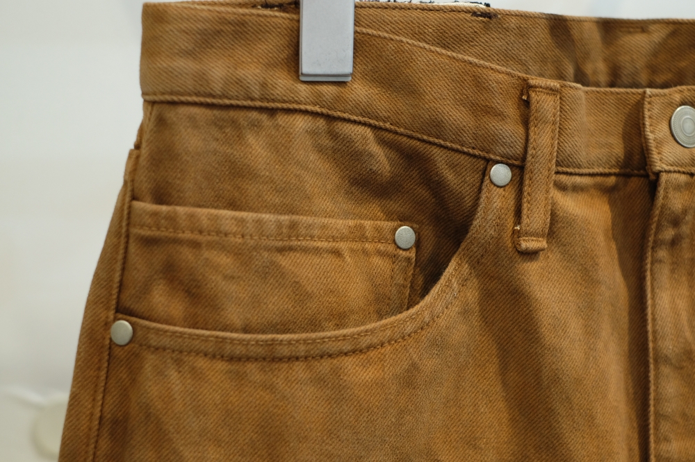 KUON（クオン）の奄美大島泥染・裂き織りパッチ5ポケットパンツ