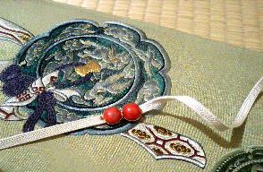 銅鏡の刺繍 綴れ帯