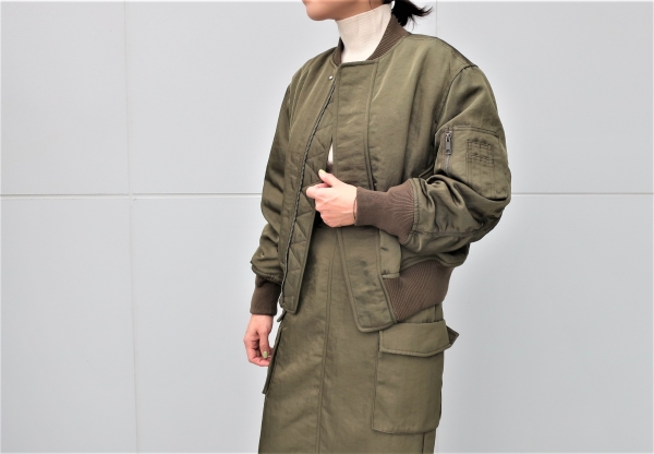 uncrave WHITE グロッシーパディング スカート アンクレイヴ