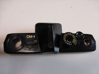 OM115