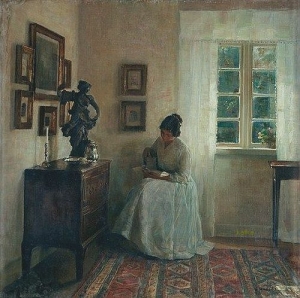 INTERIOR WITH A READING LADY