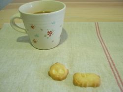 こ