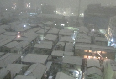雪の降る町