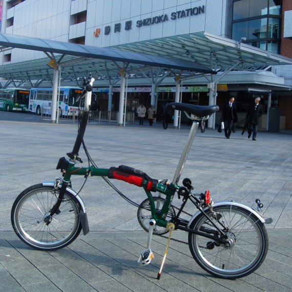 A brompton bike parked at the north wing of JR Shizuoka station