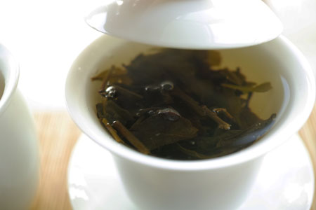 漫撒茶山黄金葉熟餅05年プーアル茶