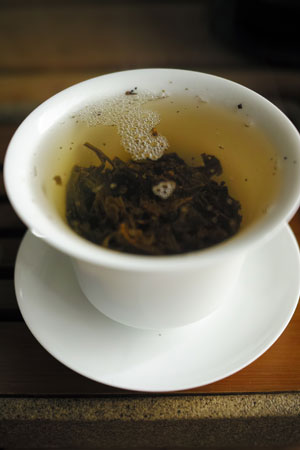 丁家老寨青餅2012年プーアル茶