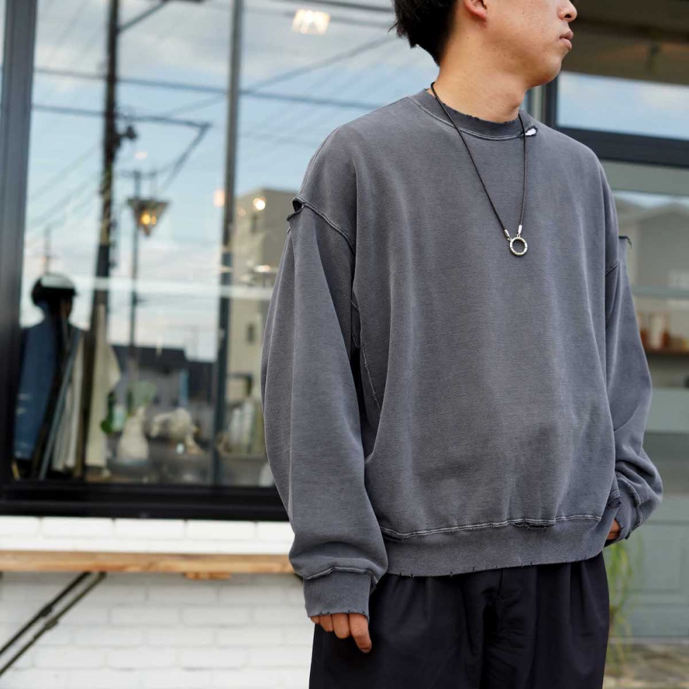 REMI RELIEF スエット　スミクロ　ダメージ加工 REMI RELIEF（レミレリーフ）の「REMI RELIEF(レミレリーフ