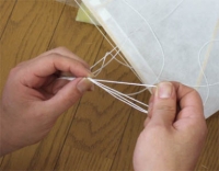 結び目を締める
