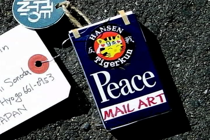 2写ピースメールアート.png